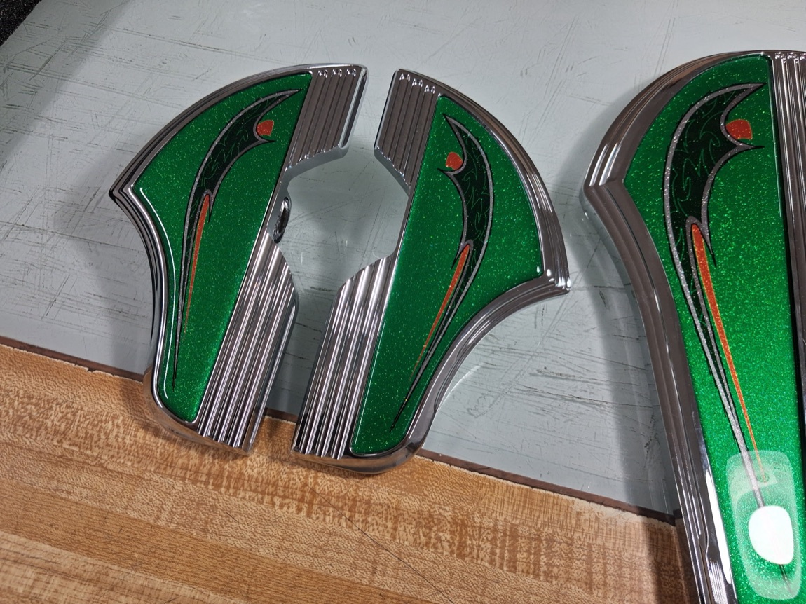 Custom green and chrome emblem pieces